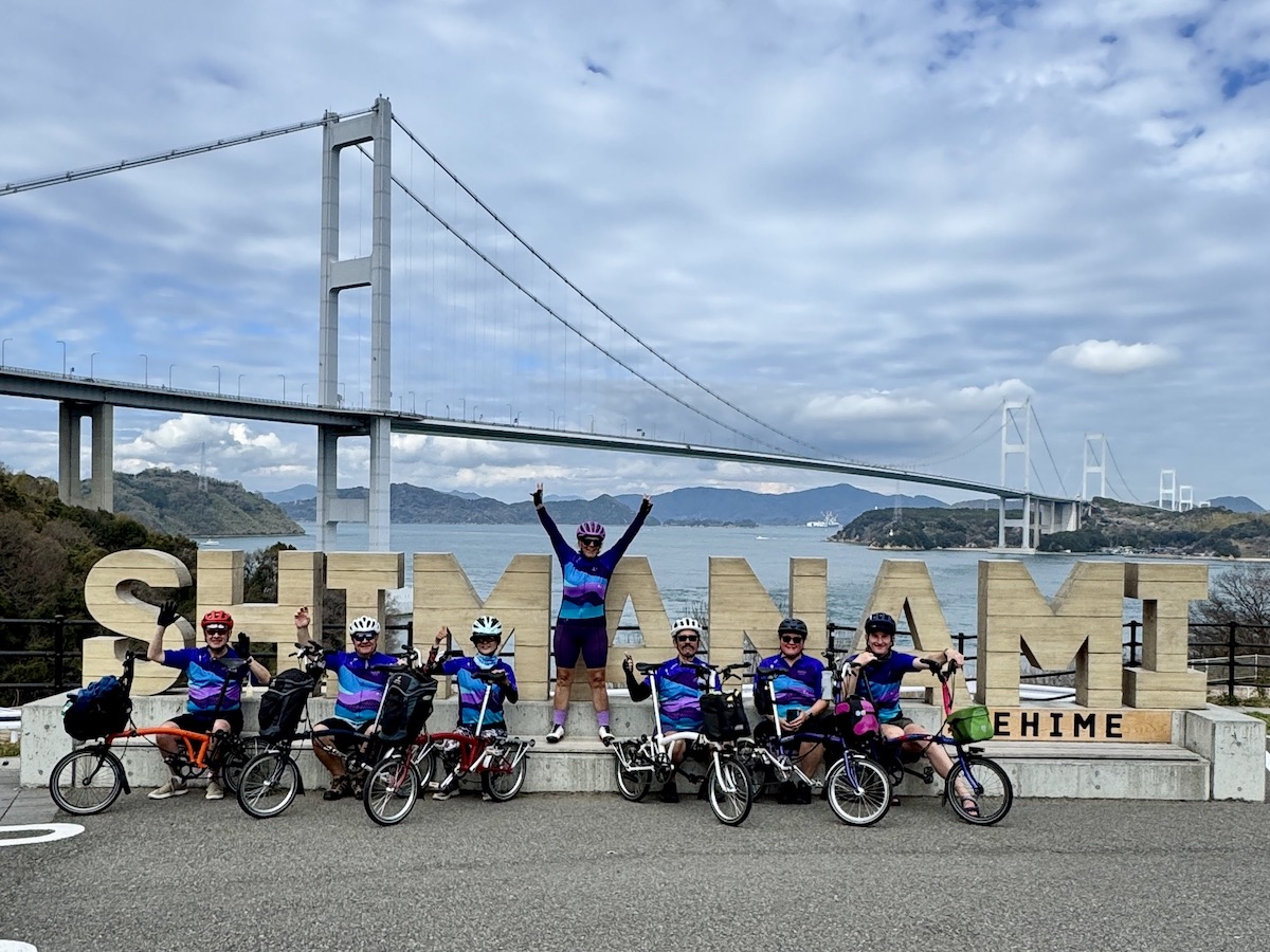 Shimanami sign with Kurushima Kaikyo Bridge in the background